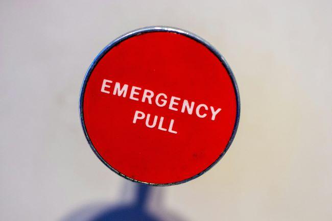 Red handle with the words 'Emergency Pull'.