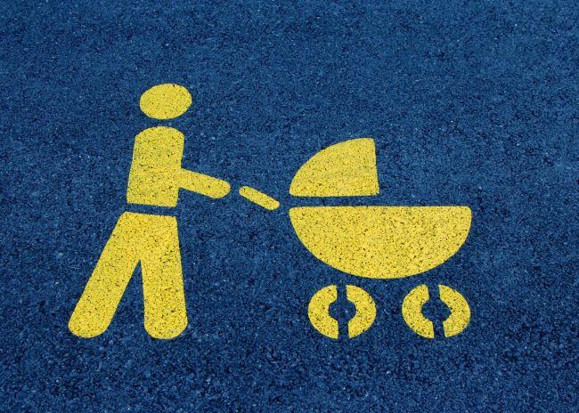 Designated parking lot sign for families with babies.