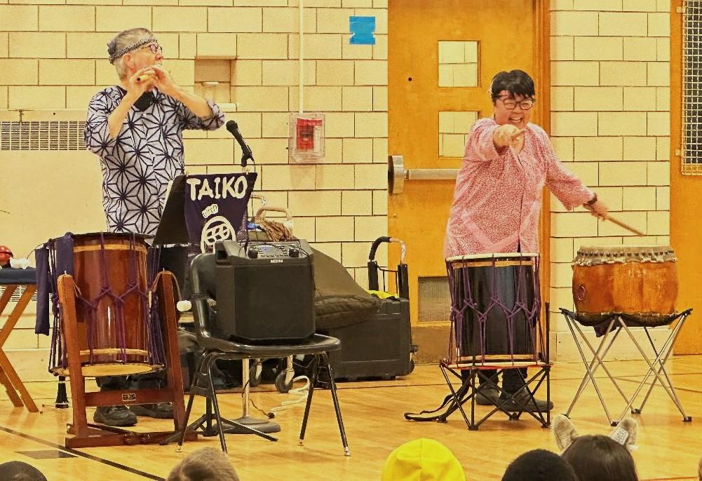 Photo of the musicians playing