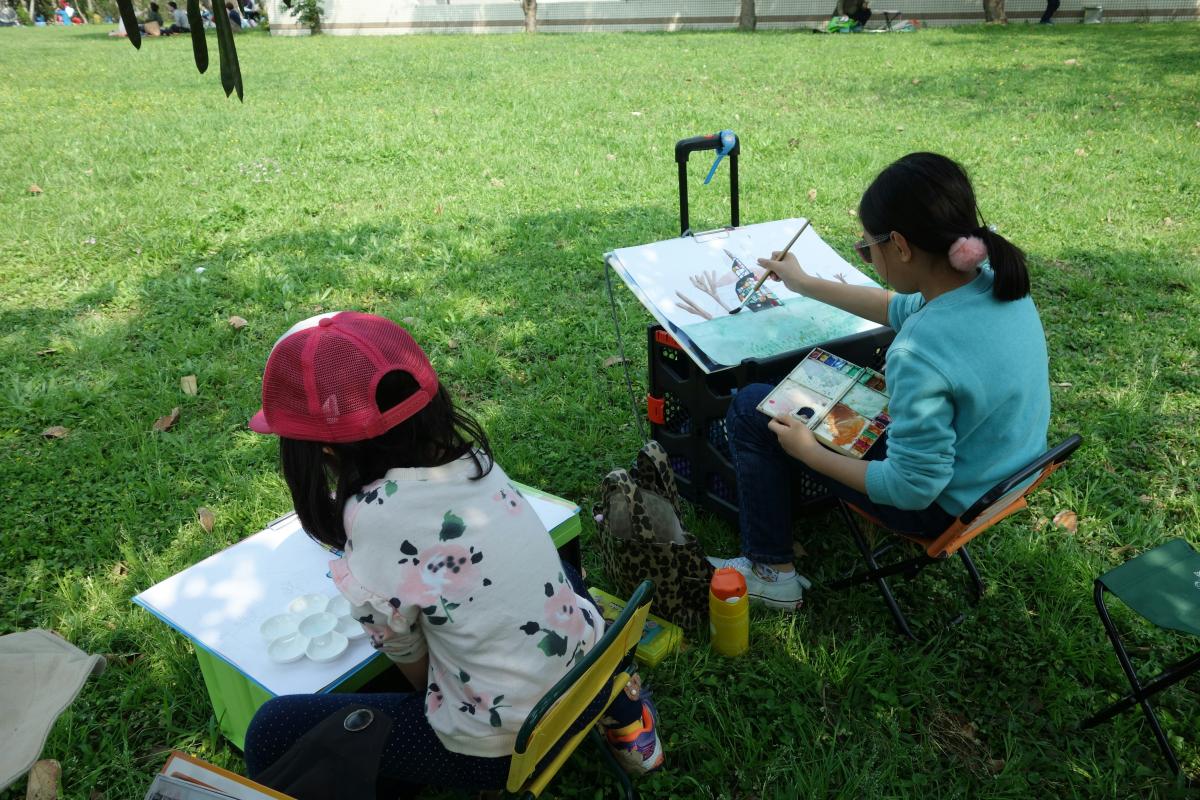 Children painting outside
