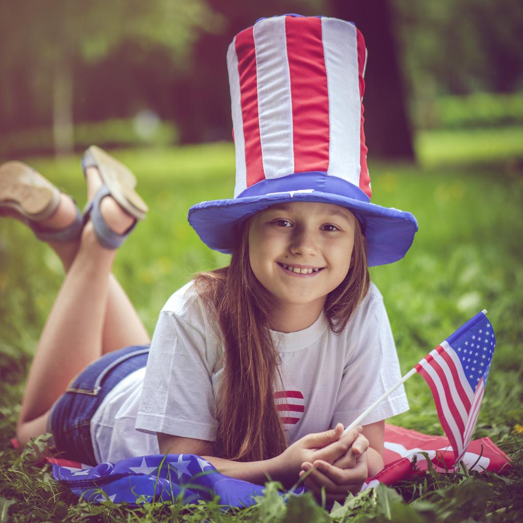 child celebrating Independence Day