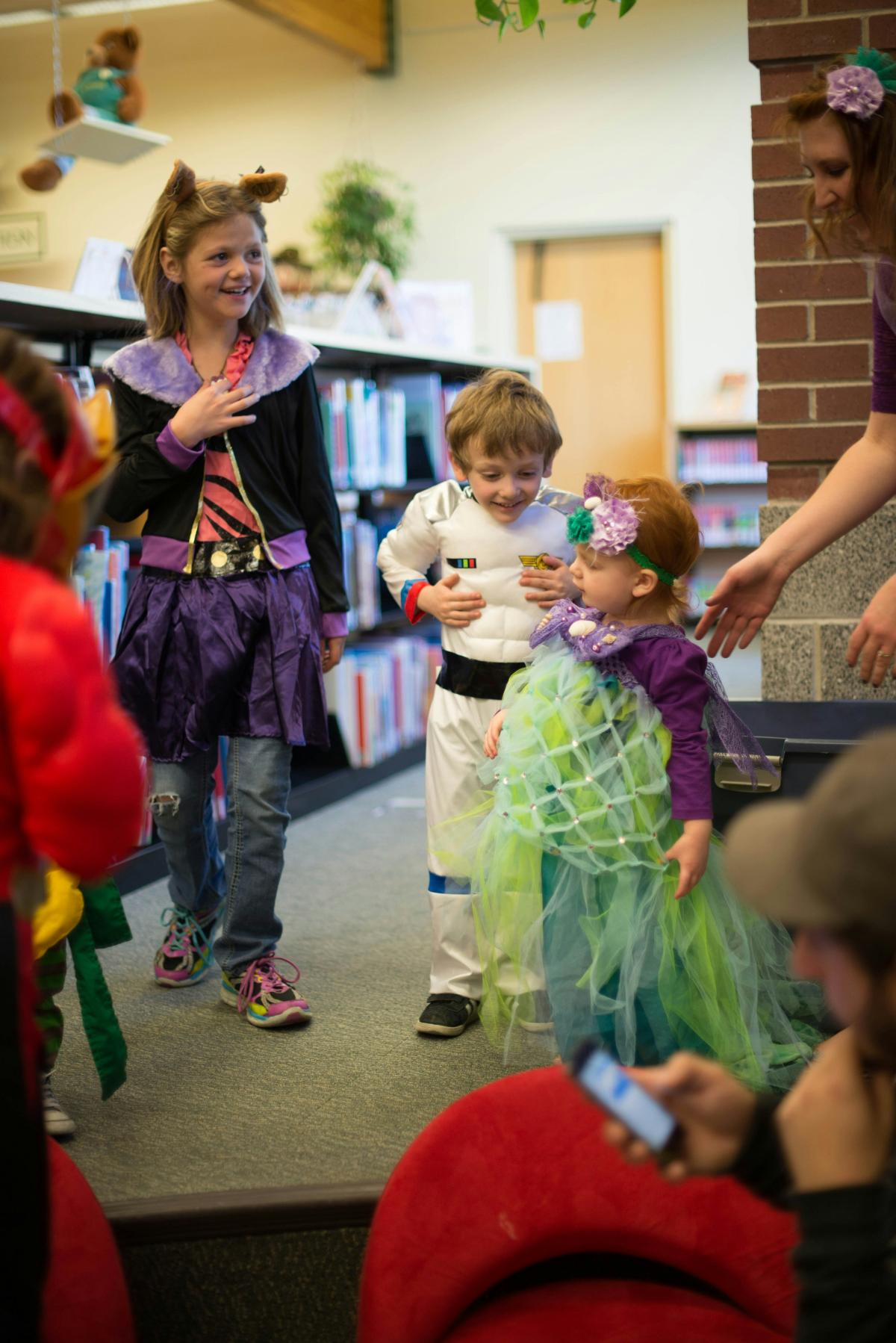 Kids in costumes at the library